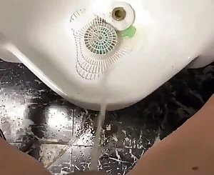 Urinate in the guys public rest room