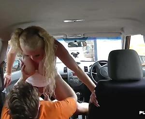 Bosomy Cougar rails driving lecturer in the car outdoor